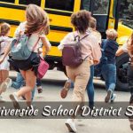 School children running to the bus